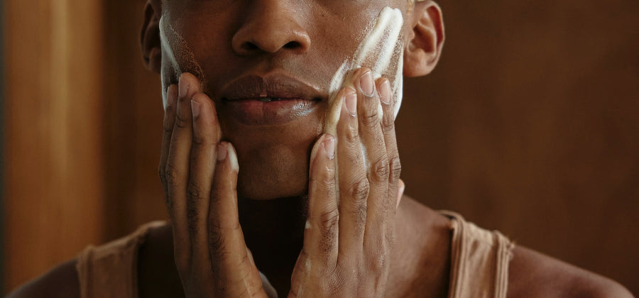 Man applies peeling to face