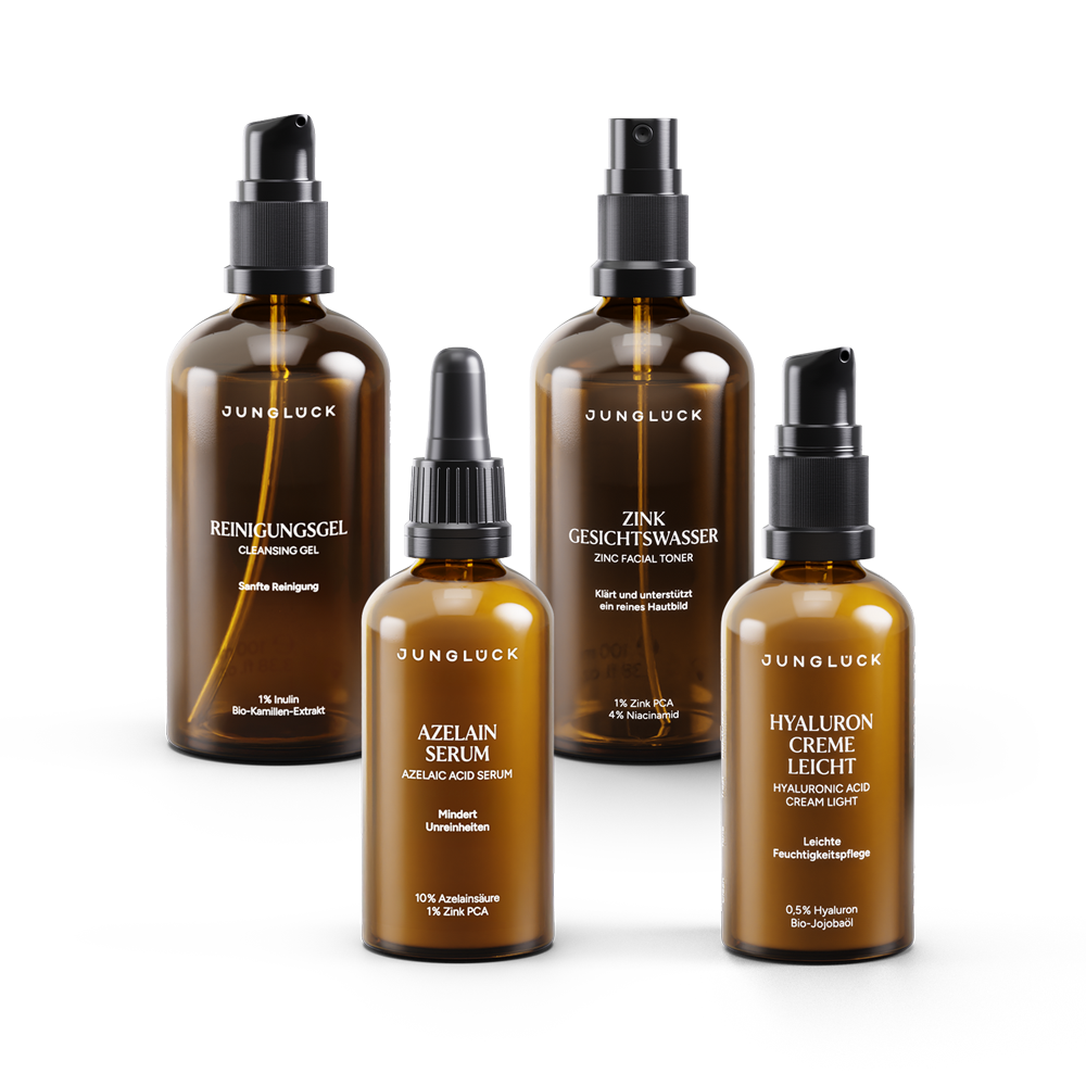 Set di prova "Bye Bye Breakouts" con quattro flaconi in vetro ambrato: Gel Detergente, Zinco Tonico , Azelain Sieri, Hyaluron