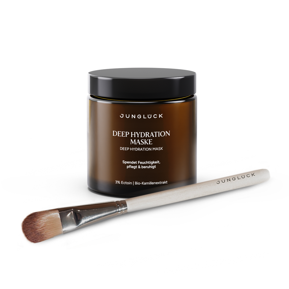 Een bruine glazen pot met het opschrift 'Deep Hydration Maske' en een applicatiekwastje. Combinatie voor intensieve