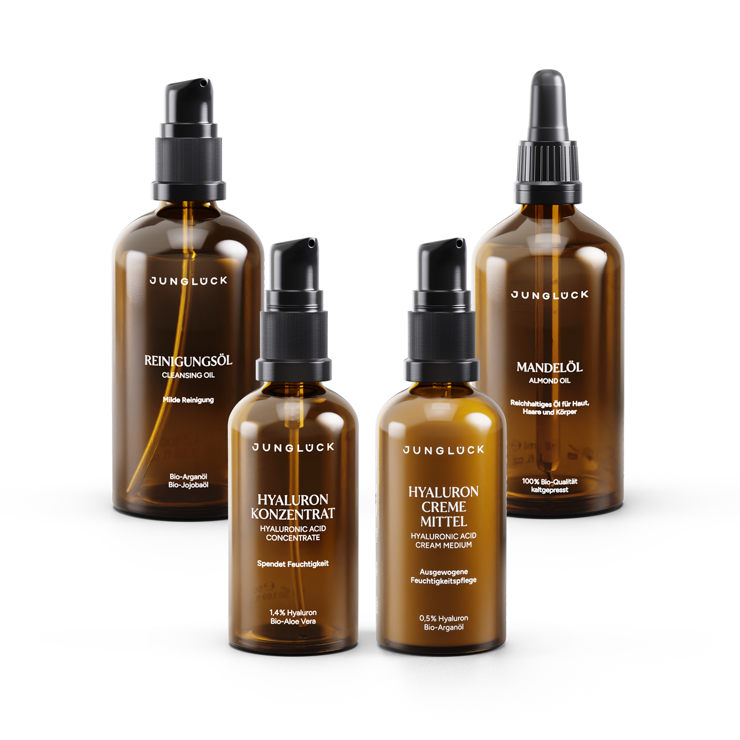 Amber glass bottles from the pregnancy care set containing " cleanser," hyaluronic acid, " Almond Oil ," and " cream" products.